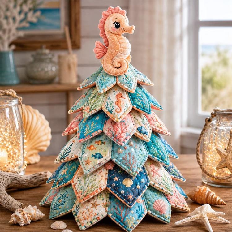 Patchwork Christmas tree ornament with orange seahorse topper and layered fabric panels