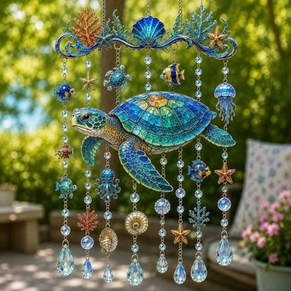 Acrylic sea turtle hanging ornament with blue bead chains, shells, and star charms