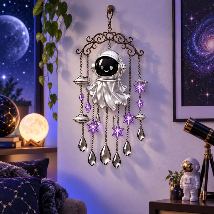 Astronaut vampire wind chime with silver suit, star charms, and hanging crystal drops