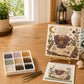 Halloween sea glass DIY art kit with witch teacup potion design on easel