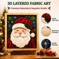 Framed layered fabric art with smiling Santa face, quilted texture and 3D details