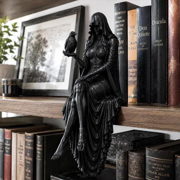Black raven goddess desktop ornament: robed figure holding a raven, detailed sculpt