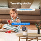 White indoor smart security camera on a table with a child and two-way audio prompts.