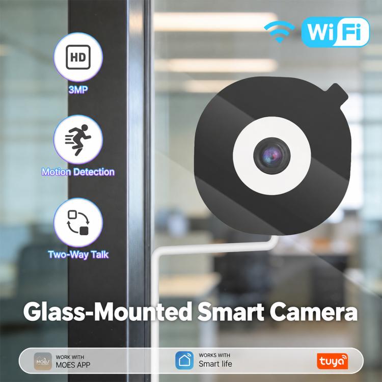 Black-and-white glass-mounted security camera on a window, front lens centered