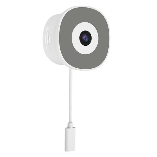Glass-mounted smart security camera with white housing and dark round lens cover