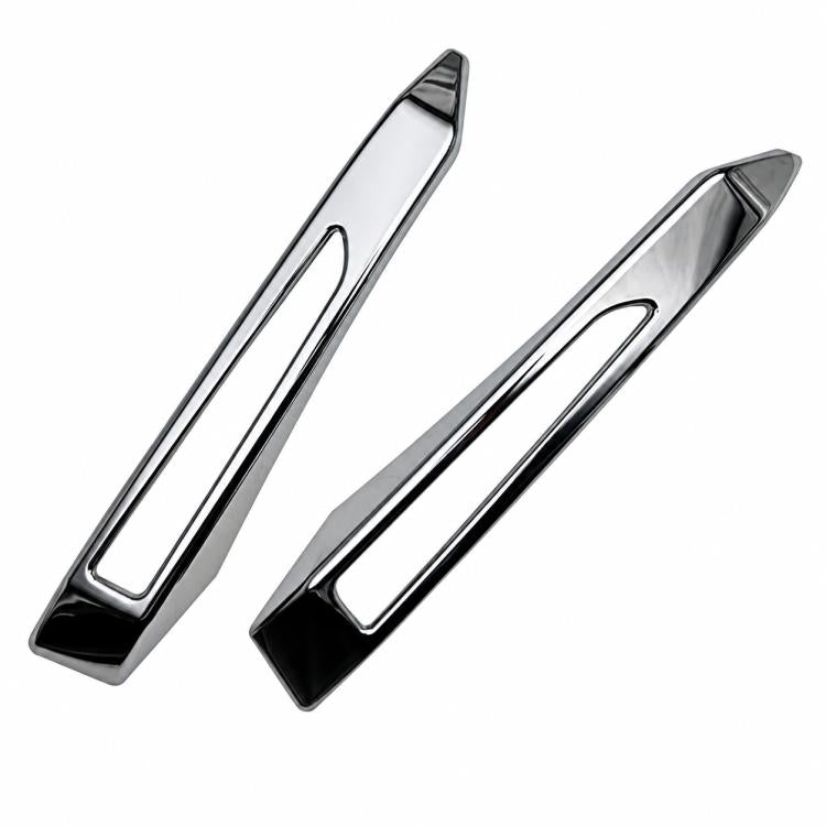 Set of two chrome fog light trim bezels with inner rectangular cutouts