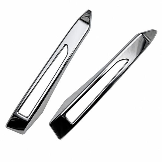 Set of two chrome fog light trim bezels with inner rectangular cutouts