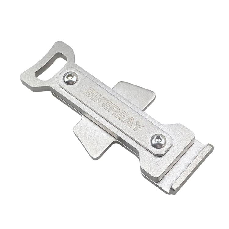 Silver metal bicycle disc brake tool with cross-shaped handle and two hex openings
