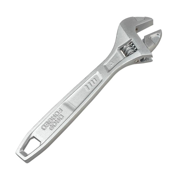 Silver adjustable wrench with worm gear mechanism and open jaw ends