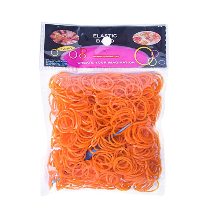 Rubber band bracelet making kit with orange elastic bands and a few blue bands