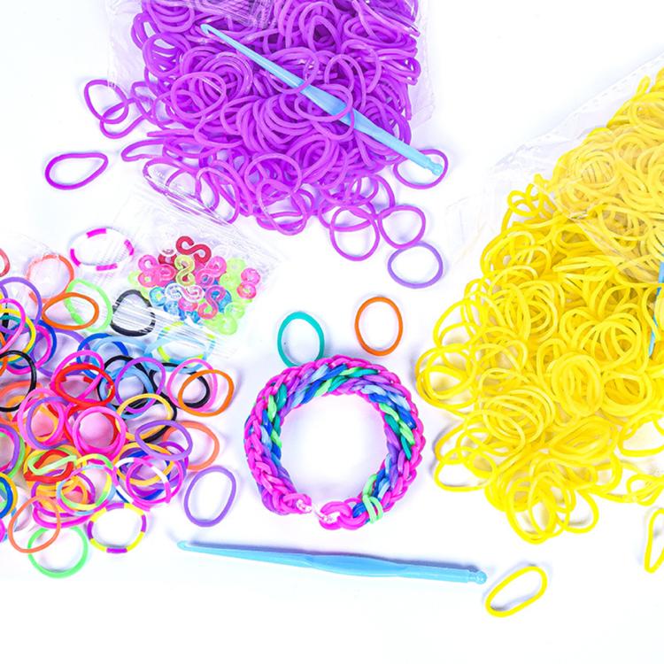 Rainbow elastic rubber bands with small braided bracelet sample and bracelet tool