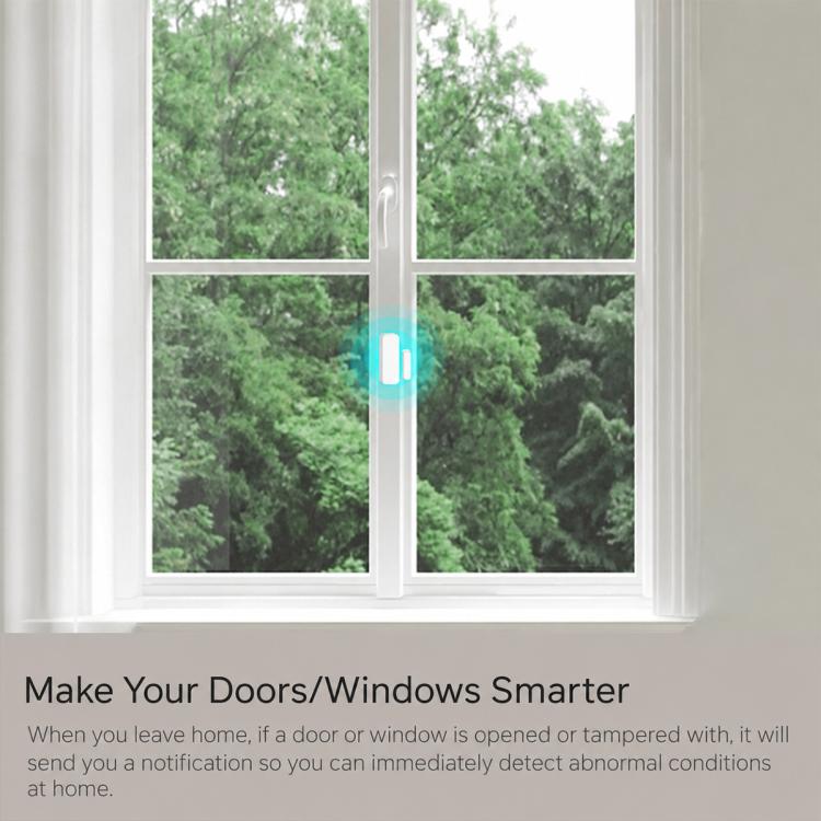 Wireless magnetic window sensor with a blue status light on the glass