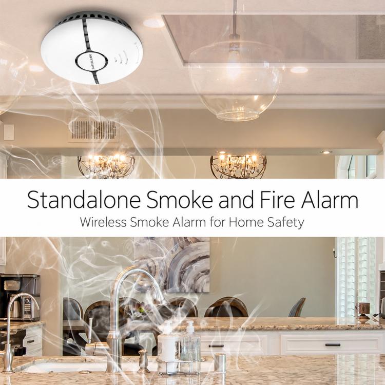 Ceiling-mounted round white smoke alarm with black center ring and vent openings