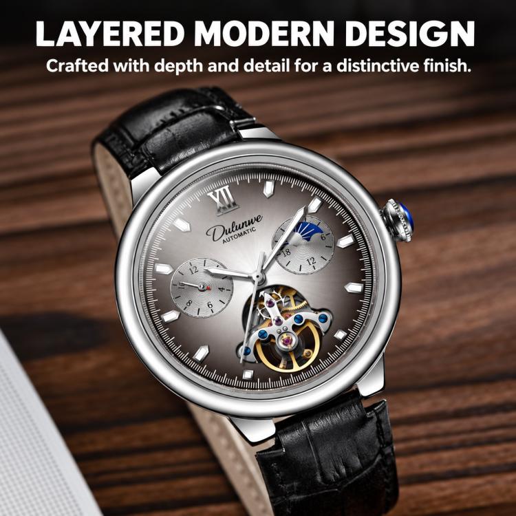 Men's automatic mechanical watch with taupe dial and black leather strap on wrist