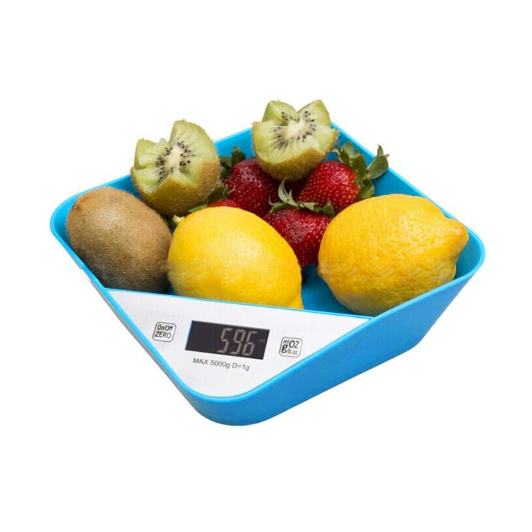Blue bowl-shaped digital kitchen scale with LCD display and fruit in tray