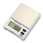Digital jewelry scale top view with wood platform and LCD screen showing weight