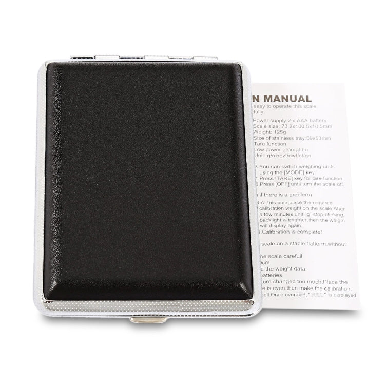 Instruction manual and warranty text on paper, inside protective case