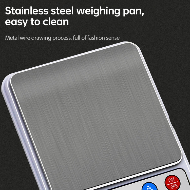 Stainless steel weighing pan surface of a portable digital kitchen scale