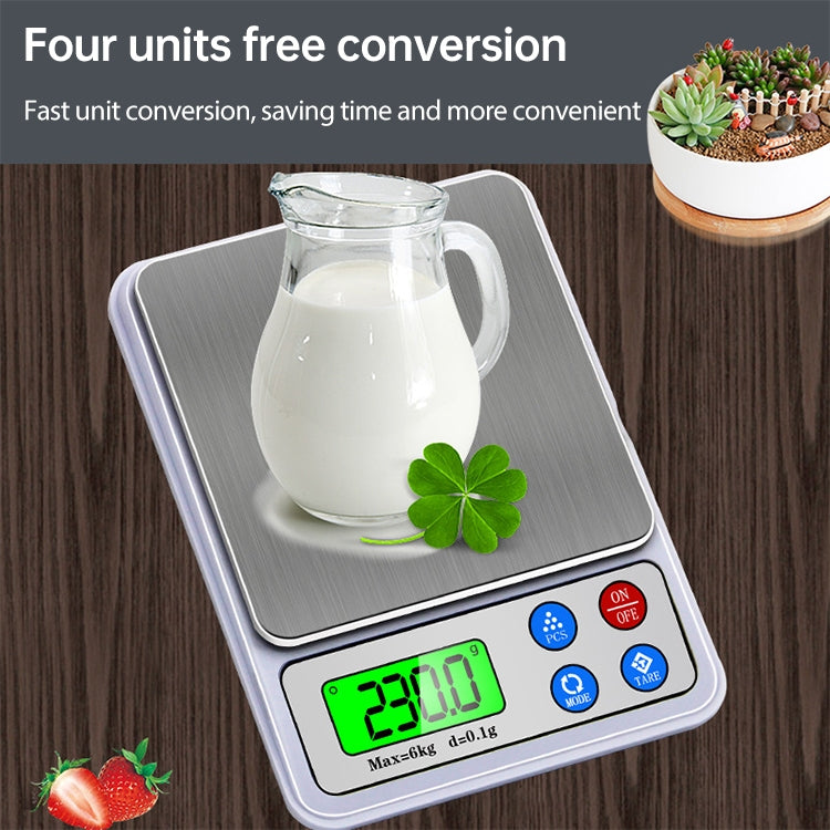 Portable digital kitchen scale on tabletop holding a milk jug and green LCD reading