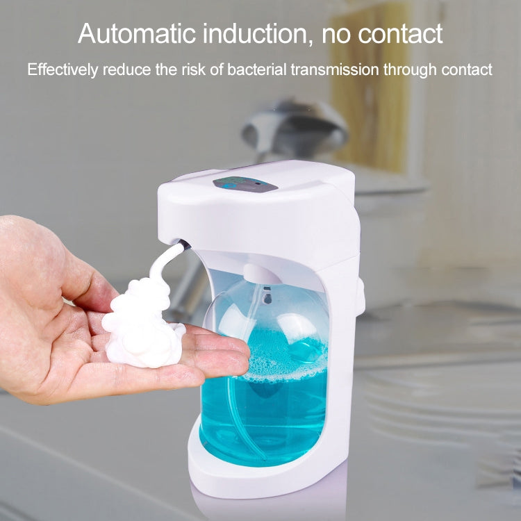 White automatic induction foam soap dispenser dispensing white foam