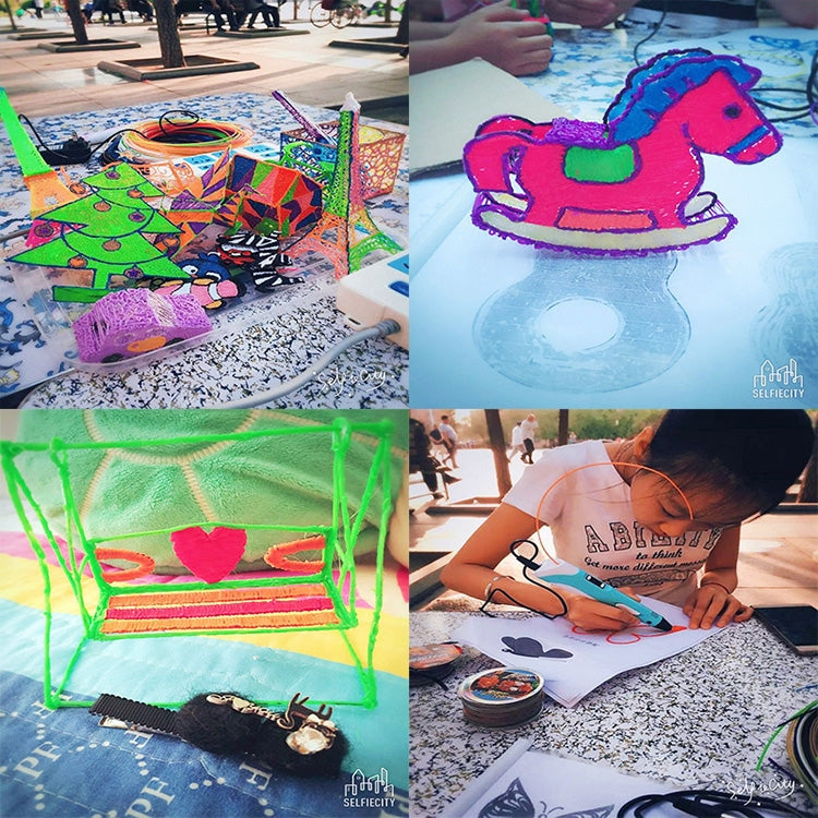 Hand-held 3D printing pen creating colorful 3D drawings and sculptures on paper