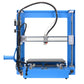 Blue desktop 3D printer front view with open build platform