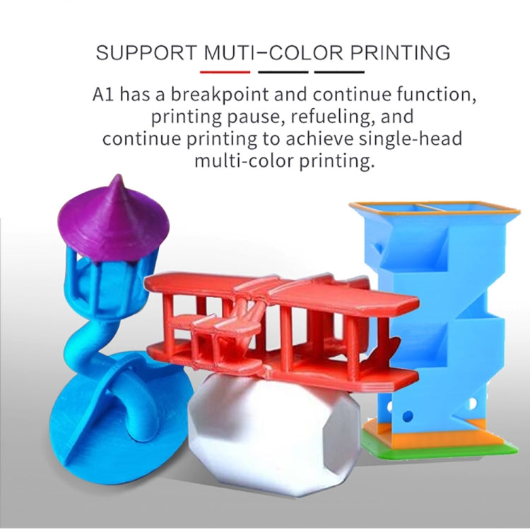 Desktop 3D printer with multicolor sculptures: purple, blue, red and white