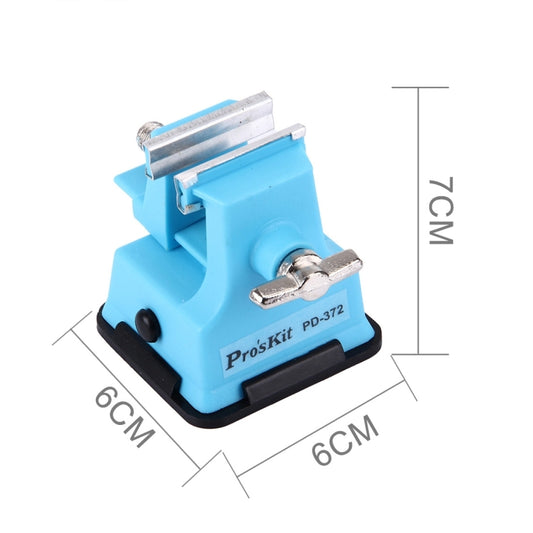 Mini table vice with blue base and steel jaws, labeled dimensions 6 cm x 7 cm