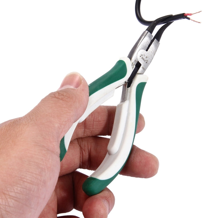 Outer curved circlip pliers held in hand with green-and-white insulated grips