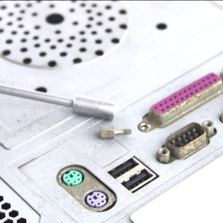 12mm socket head screwdriver tip near computer connectors on electronics board