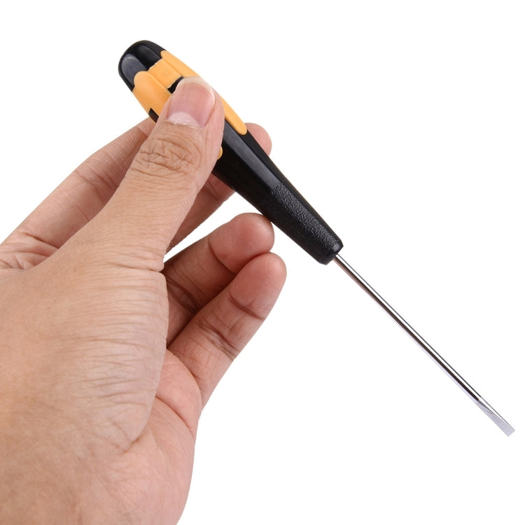 WLXY 3x75mm slotted screwdriver held in hand, black-and-orange handle