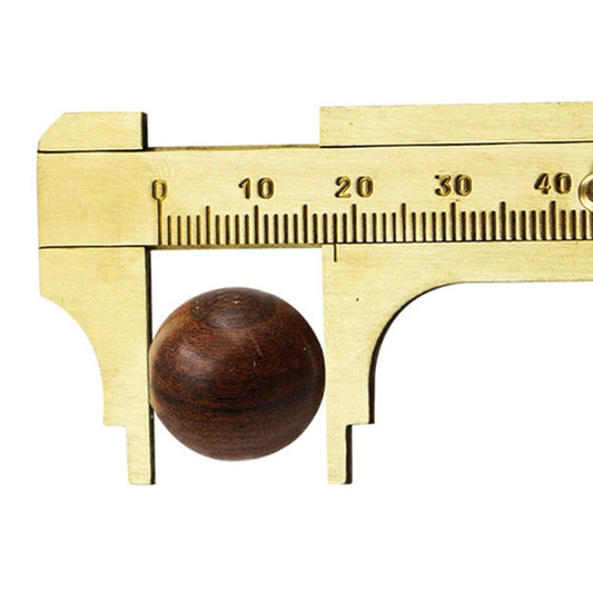 Brass sliding vernier caliper with inner jaws and engraved scale, with wooden bead