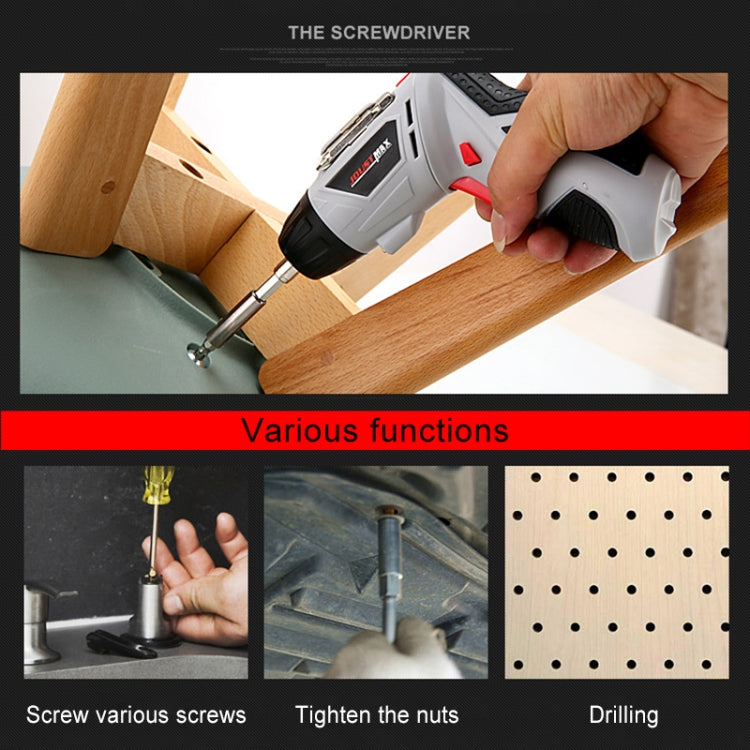 Cordless electric screwdriver driving a screw into wood with interchangeable bit