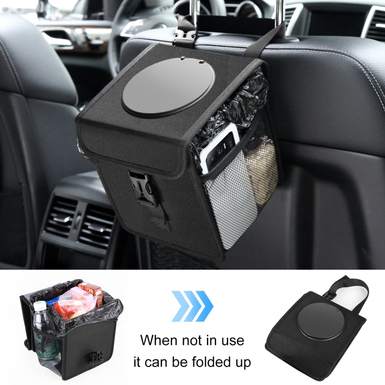 Black foldable car trash can with round lid, side mesh pocket, and hanging strap