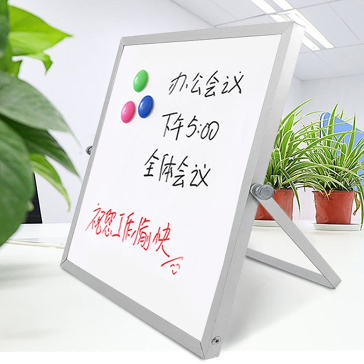 Tabletop magnetic whiteboard on easel with colorful magnets on blank white surface