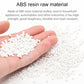 ABS resin plastic pellets in hand for durable desktop storage box material