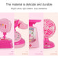 Pink toy appliance parts display, including dial, fan, and liquid-style screen