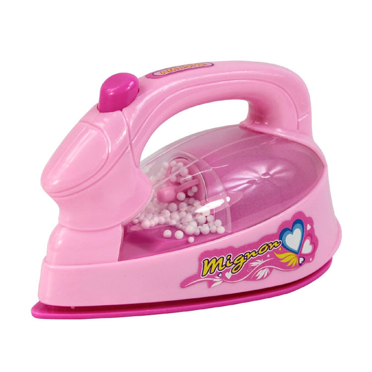 Pink plastic children’s pretend iron toy with clear water tank and bead detail