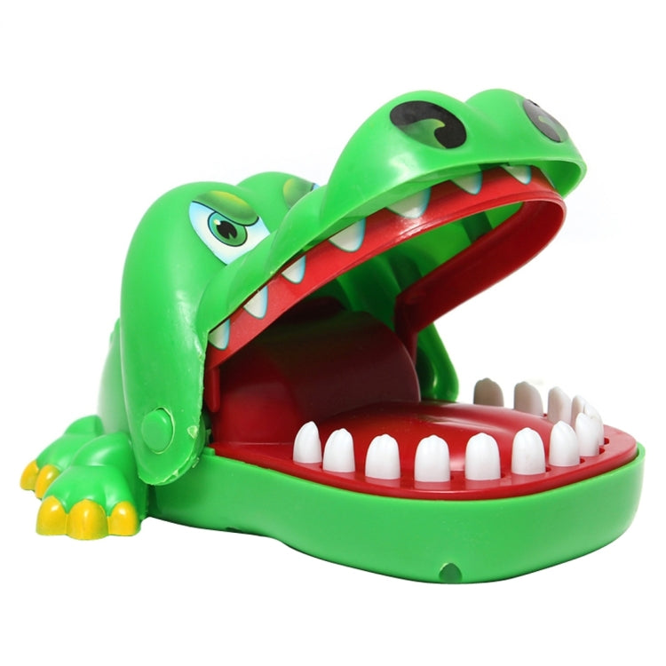 Green crocodile mouth toy with bright eyes and visible white teeth