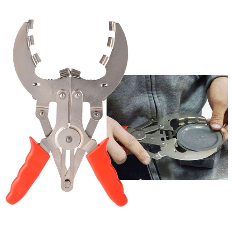 Adjustable piston ring compressor tool with red handles and steel clamp