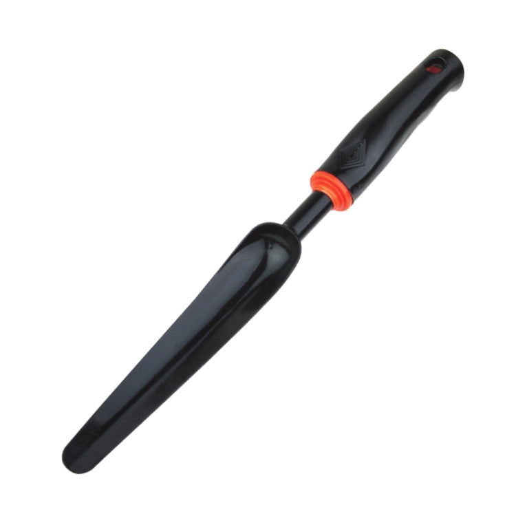 Round weed puller tool with black rubber handle and orange grip ring