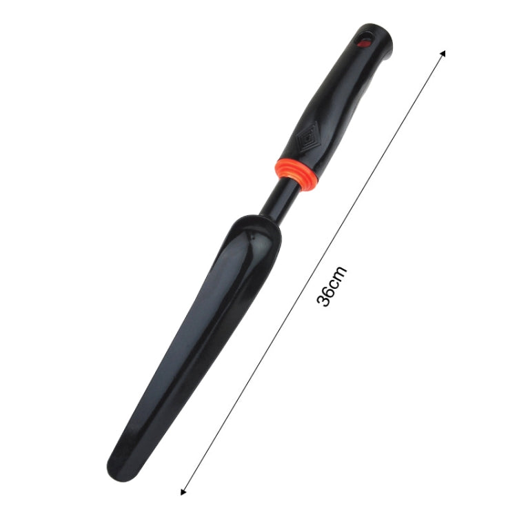 Round weed puller with black handle, orange grip ring; 36 cm overall length