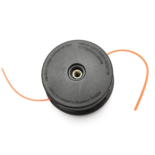 Round trimmer head underside with metal center fitting and orange line