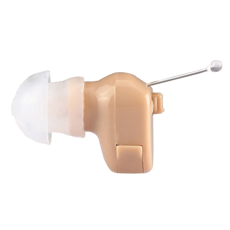 Beige mini in-ear hearing aid side view with clear earpiece and silver tip