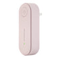 Mini ultrasonic deodorizer device, pink side view with power button and wall plug
