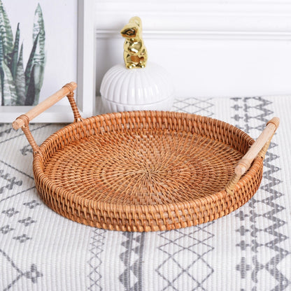 Braided snack storage basket tray with two wooden handles, woven tan oval base