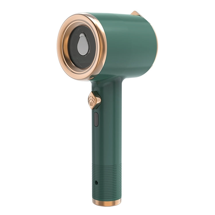 Handheld garment steamer, green handle with rose-gold round nozzle and black steam opening