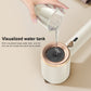 Handheld steamer with open water tank and clear water being poured into the top
