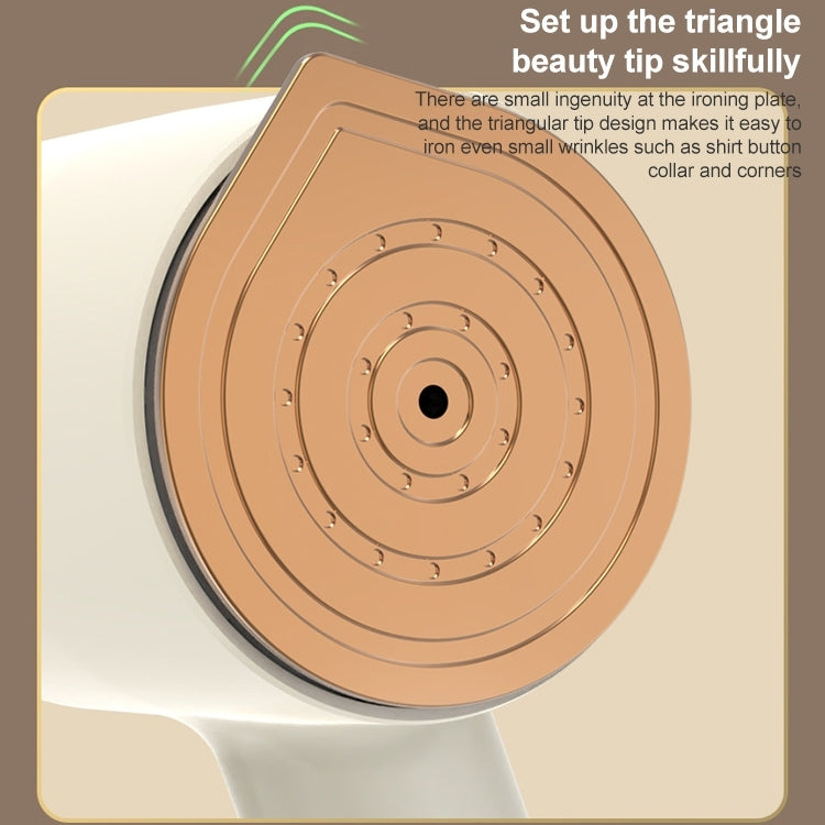 Close-up of steamer nozzle tip and circular heating plate on a white handle