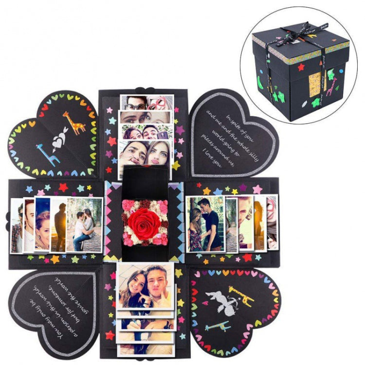 Black handmade photo explosion album with heart-shaped panels, framed photos, and rose accent